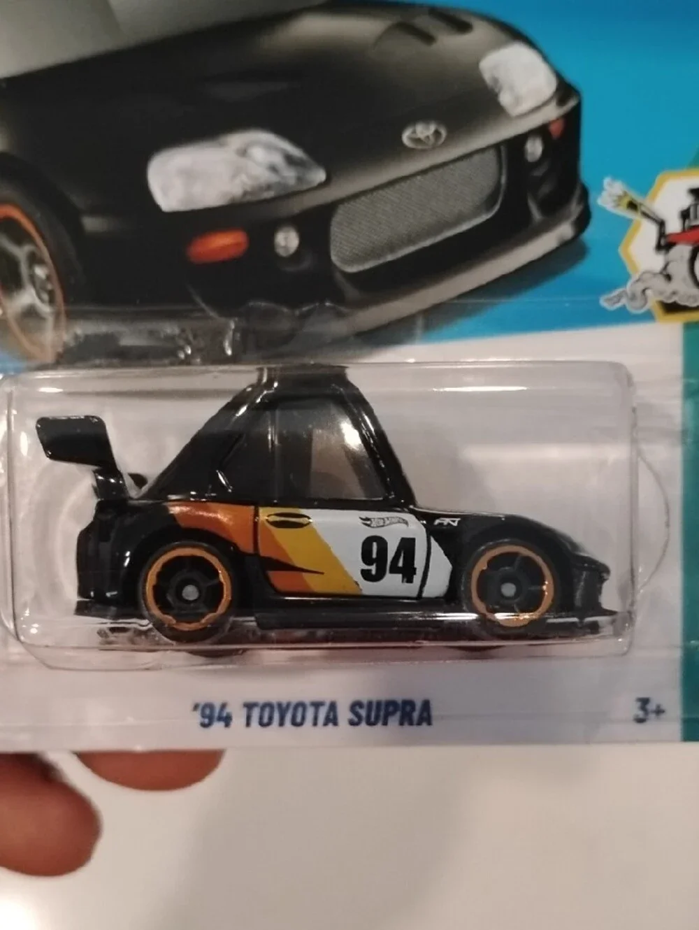 Mattel Hot Wheels '94 Toyota Supra Black with Orange and White Racing Graphics